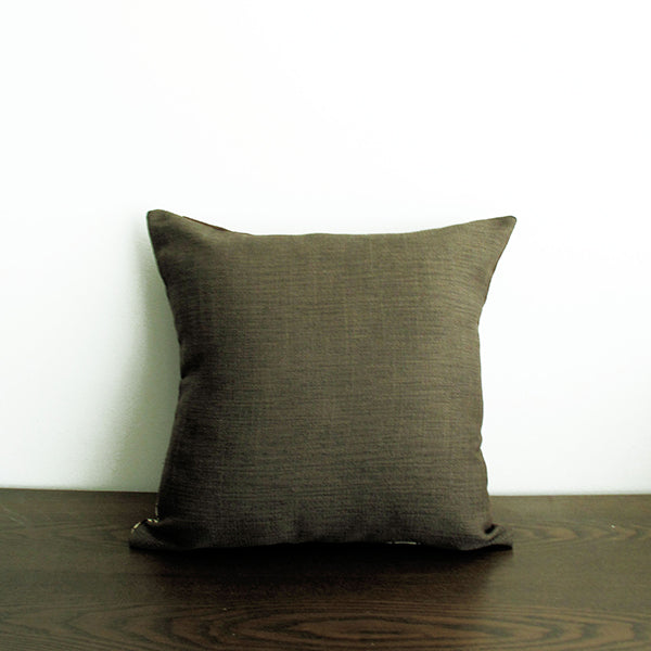 Brown throw pillow